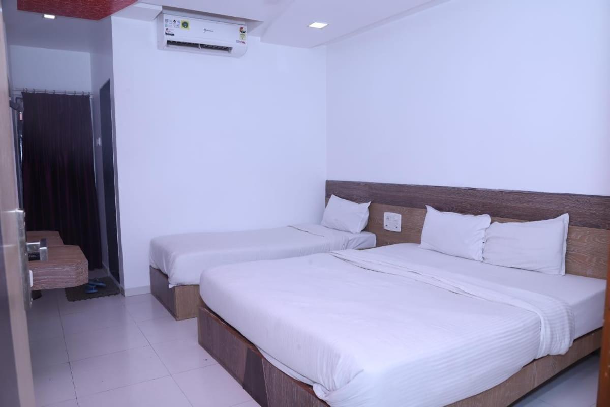 Hotel Kewal Inn Jalgaon Extérieur photo