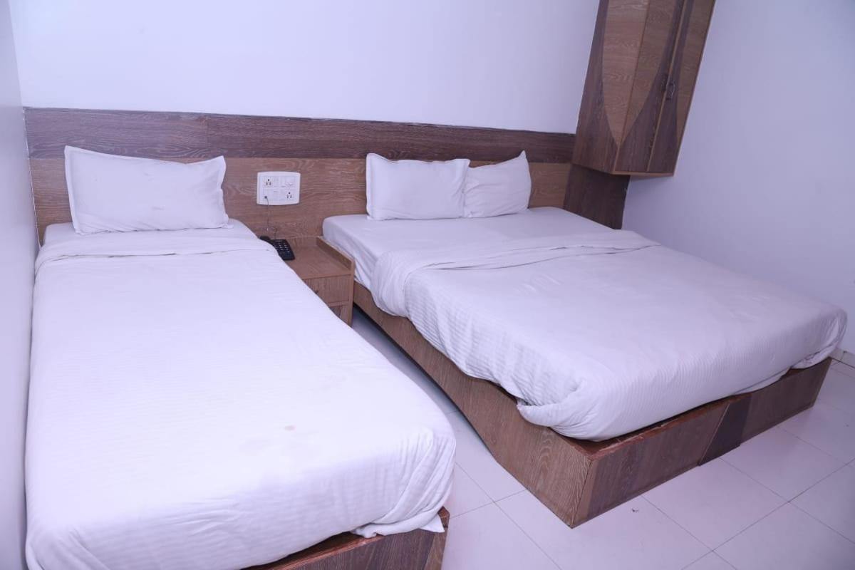 Hotel Kewal Inn Jalgaon Extérieur photo